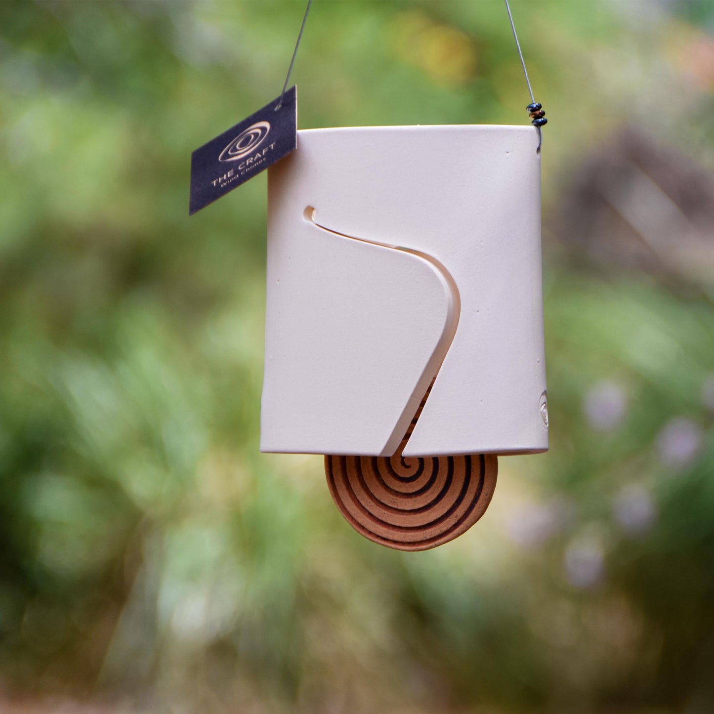 Modern Ceramic Wind Chime in Elegant White with Spiral Pendant
