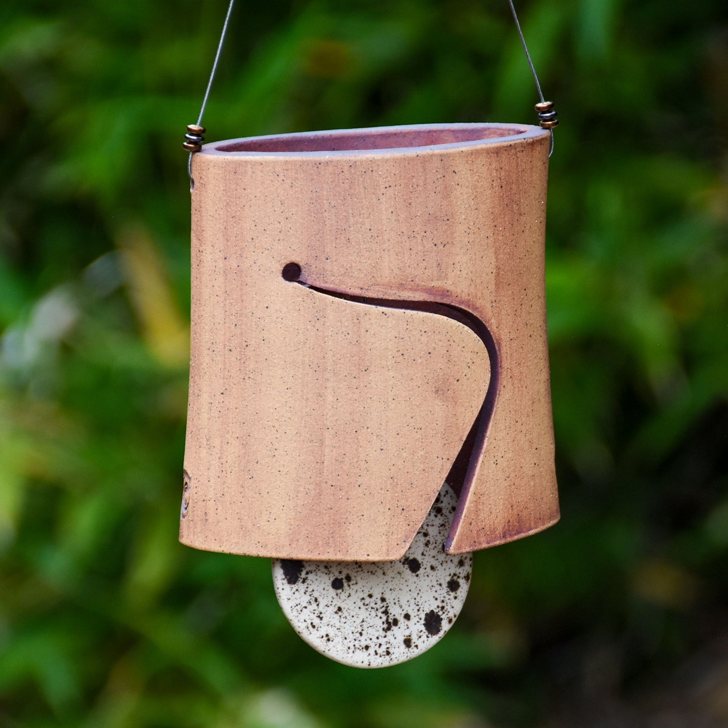 Modern Ceramic Wind Chime with Rustic Charm and Speckled Black and White Clapper