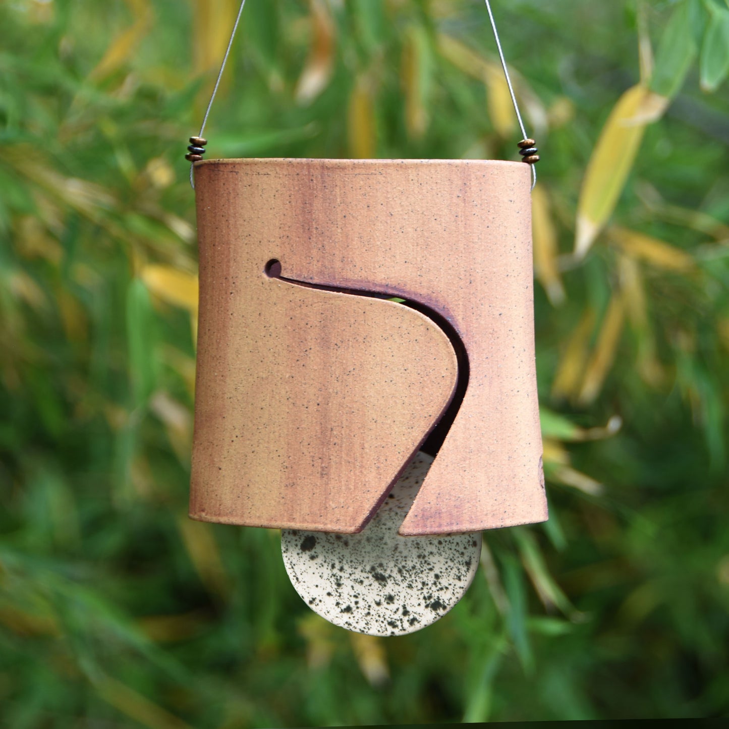 Modern Ceramic Wind Chime with Rustic Charm and Speckled Black and White Clapper