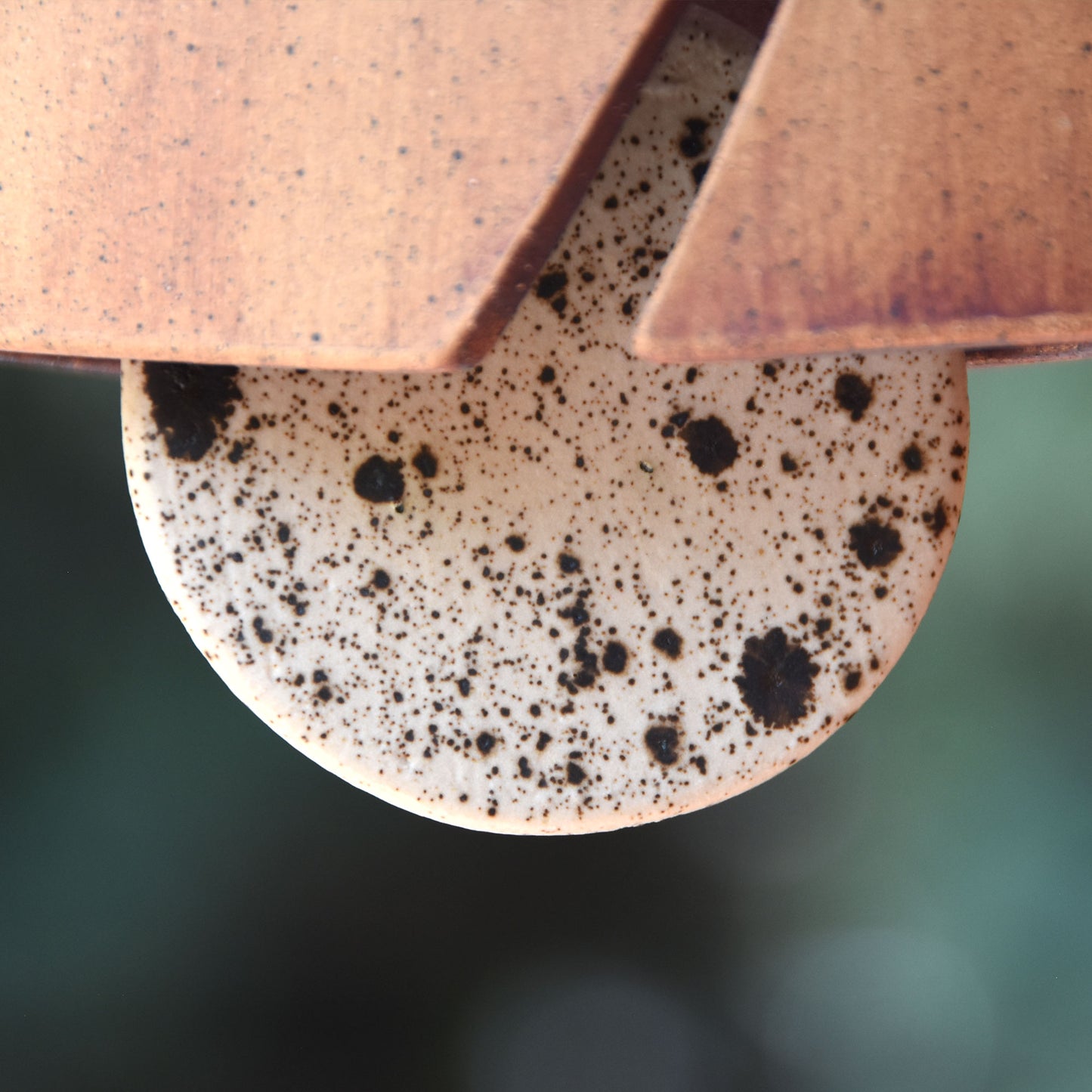 Modern Ceramic Wind Chime with Rustic Charm and Speckled Black and White Clapper