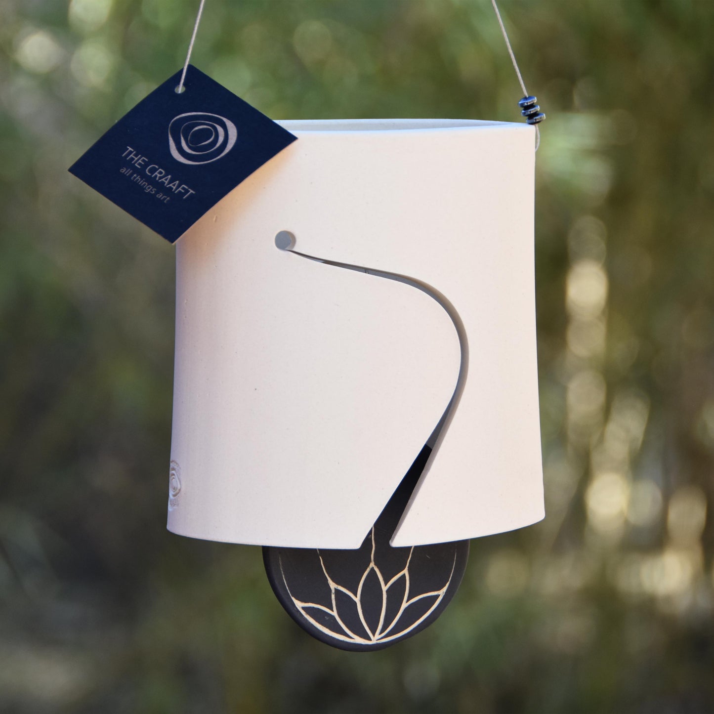 Modern Ceramic Wind Chime in Elegant White with Lotus Pendant